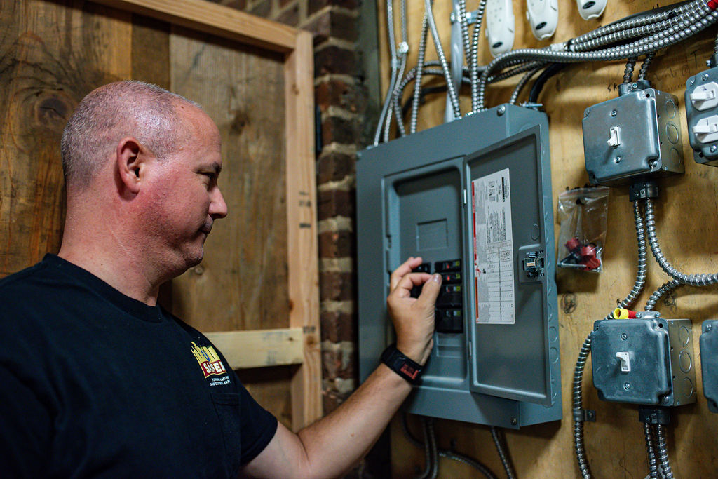 Electrician wokring on Electrical Panel Repair